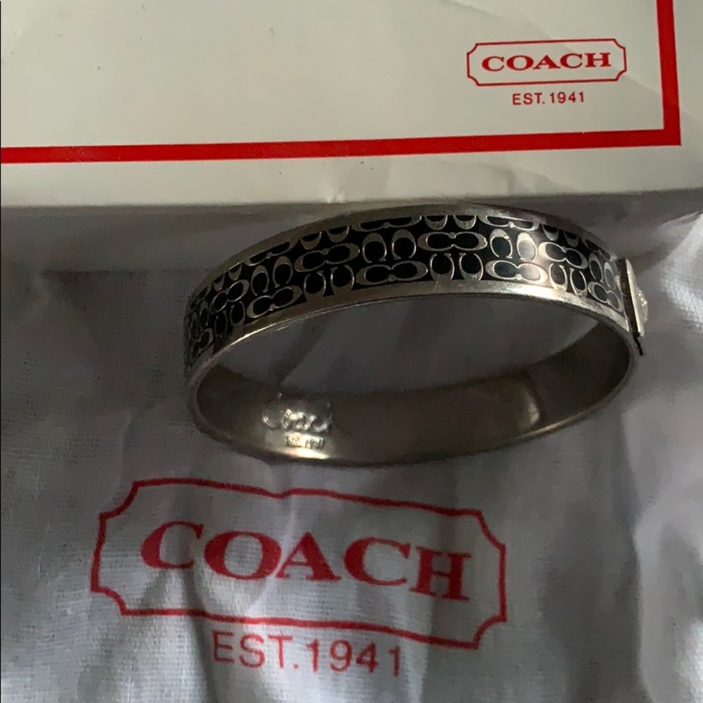 Women’s coach bangle with box and bag.